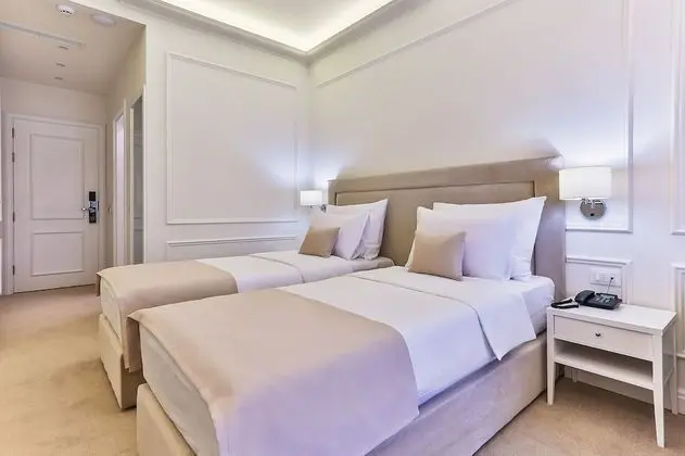 Deluxe Tek Büyük veya İki Ayrı Yataklı Oda