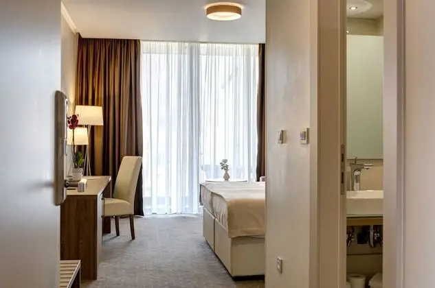 Deluxe Tek Büyük veya İki Ayrı Yataklı Oda, Balkon
