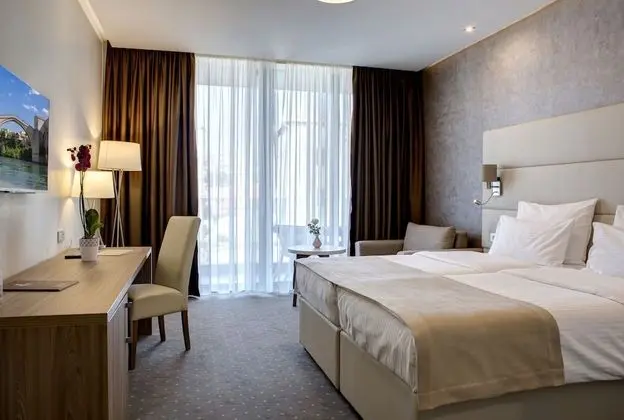 Deluxe Tek Büyük veya İki Ayrı Yataklı Oda, Balkon