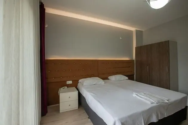 Üç Kişilik Oda