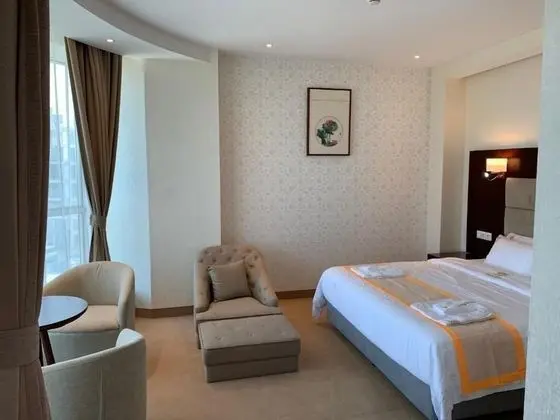 Deluxe Tek Büyük veya İki Ayrı Yataklı Oda