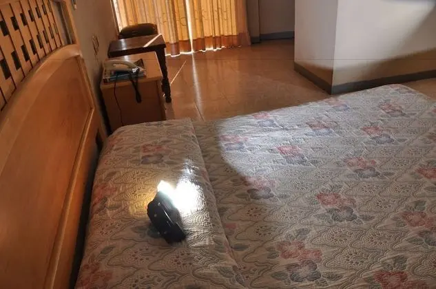 Habitacion estandar: 1 camas Matrimonial  con bano privado y vista a la ciudad.