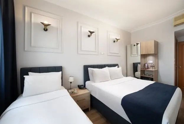 Deluxe Üç Kişilik Oda