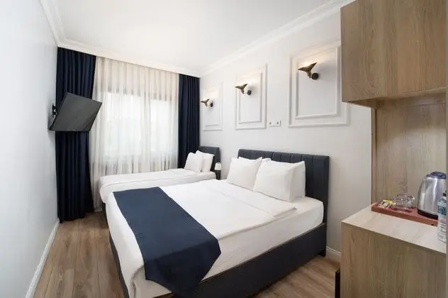 Deluxe Üç Kişilik Oda