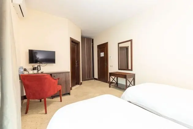 Deluxe Tek Büyük veya İki Ayrı Yataklı Oda