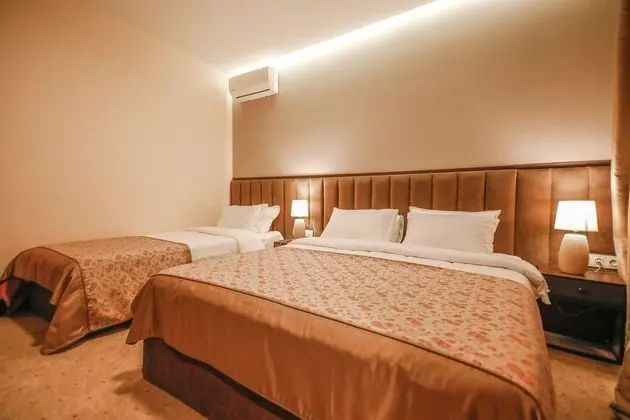 Deluxe Üç Kişilik Oda