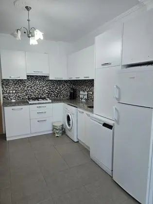 Aile Suiti,Deniz Veya Bahçe Manzaralı,2. Kat Balkonlu