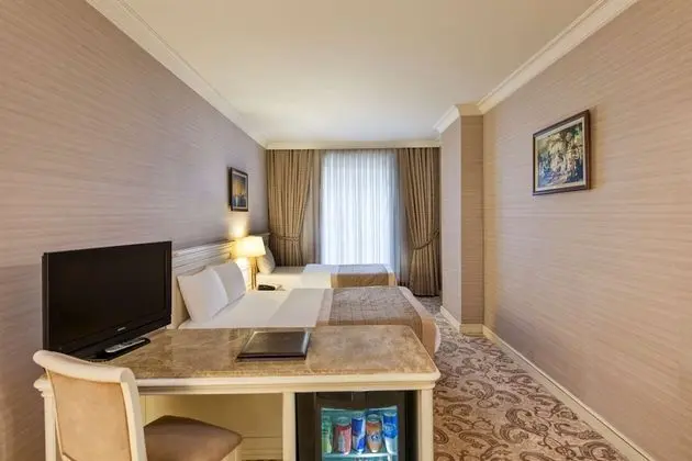 Classic Room with 1 King + 1 Single