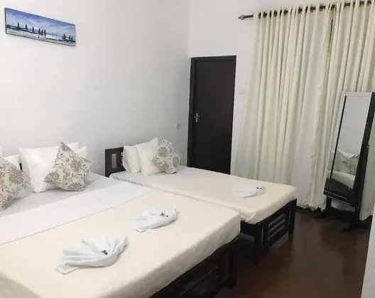 Üç Kişilik Oda