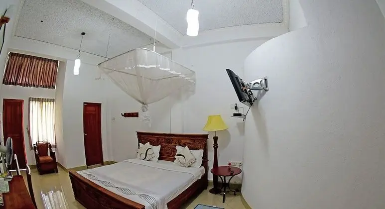 Deluxe Tek Büyük veya İki Ayrı Yataklı Oda