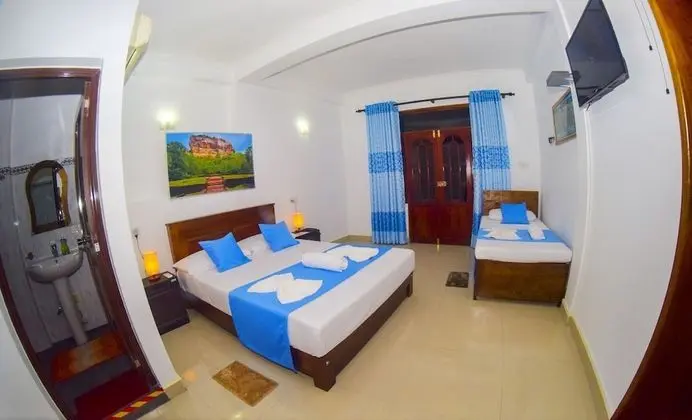 Deluxe Üç Kişilik Oda