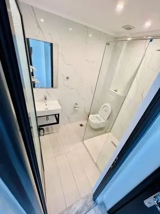 Tek Büyük veya İki Ayrı Yataklı Oda, Bahçe Manzaralı