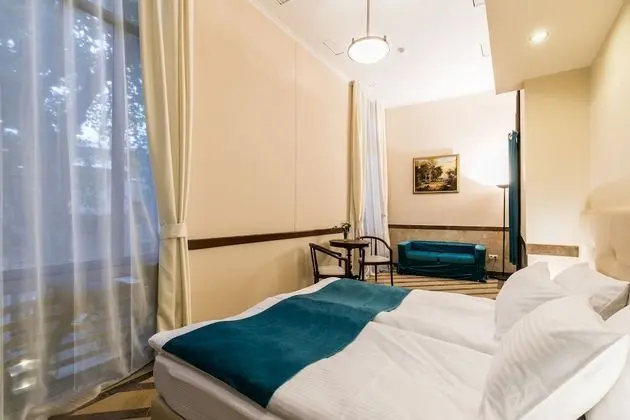 Deluxe Tek Büyük veya İki Ayrı Yataklı Oda