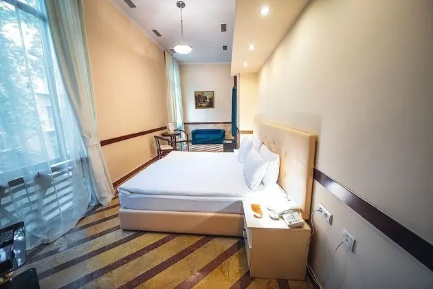 Deluxe Tek Büyük veya İki Ayrı Yataklı Oda