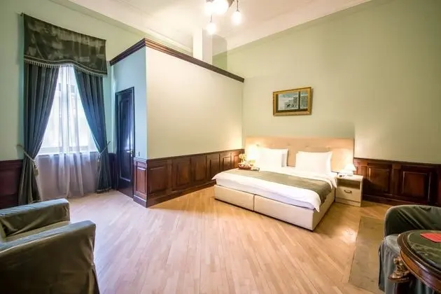 Deluxe Tek Büyük veya İki Ayrı Yataklı Oda