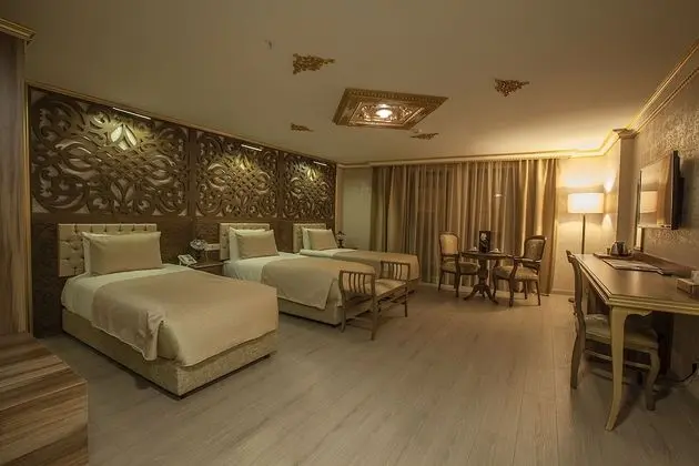 Deluxe Tek Büyük veya İki Ayrı Yataklı Oda