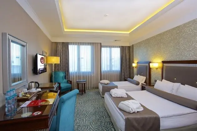 Deluxe Üç Kişilik Oda