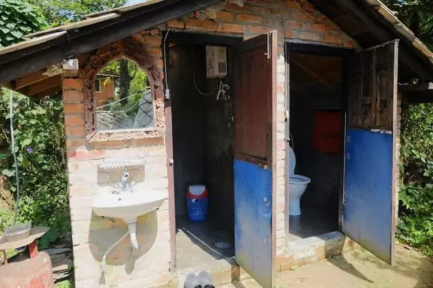 Basic Tek Büyük Yataklı Oda, Ortak Banyo, Bahçe Manzaralı