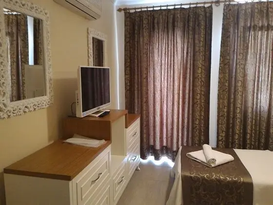 1 Çift ​​kişilik Yatak Side Sea View