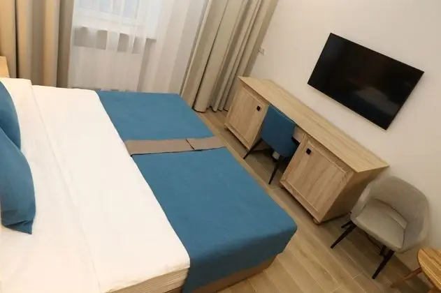 Deluxe Tek Büyük veya İki Ayrı Yataklı Oda