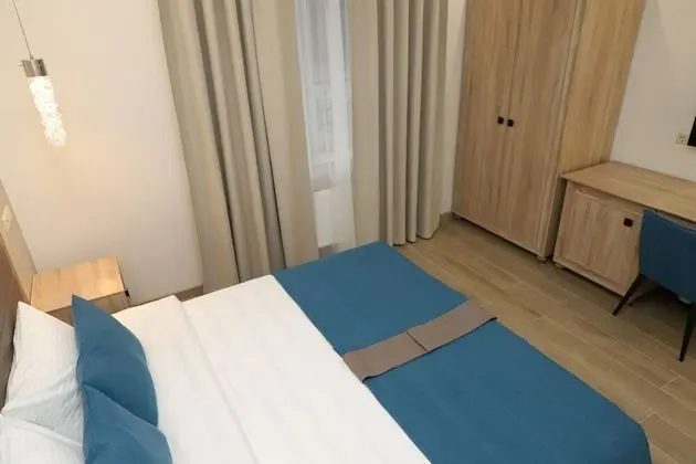 Deluxe Tek Büyük veya İki Ayrı Yataklı Oda