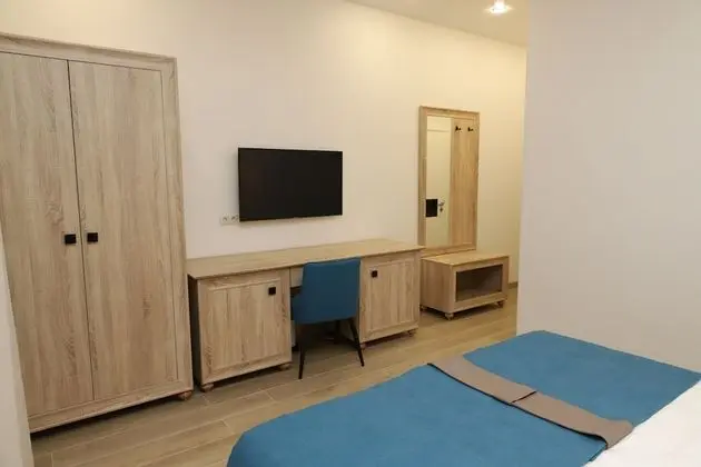 Deluxe Tek Büyük veya İki Ayrı Yataklı Oda