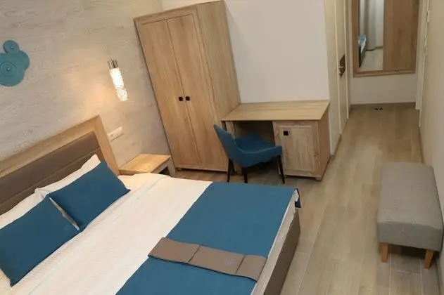 Deluxe Tek Büyük veya İki Ayrı Yataklı Oda
