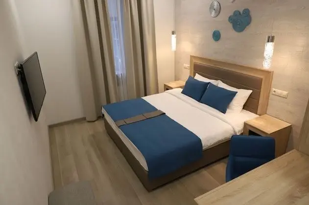 Deluxe Tek Büyük veya İki Ayrı Yataklı Oda