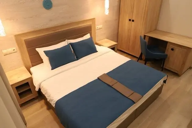 Deluxe Tek Büyük veya İki Ayrı Yataklı Oda