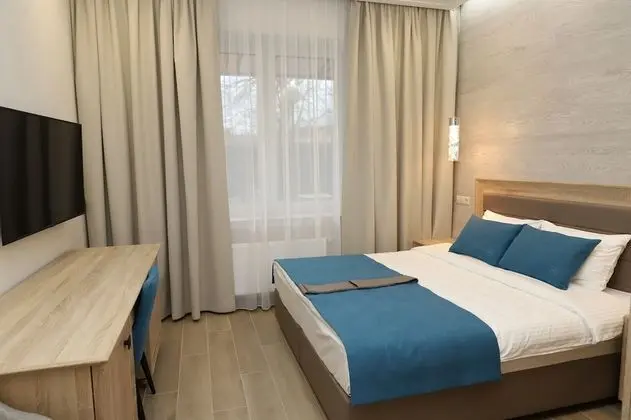 Deluxe Tek Büyük veya İki Ayrı Yataklı Oda