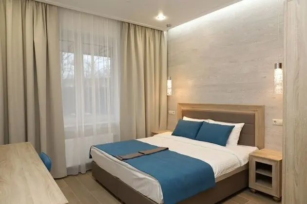 Deluxe Tek Büyük veya İki Ayrı Yataklı Oda