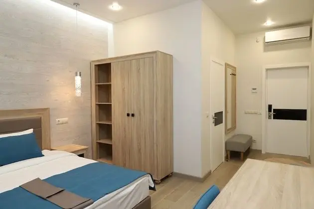 Deluxe Tek Büyük veya İki Ayrı Yataklı Oda