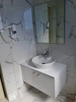 Üç Kişilik Oda