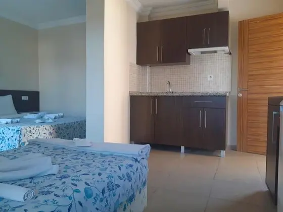 Üç Kişilik Oda, Bahçe Manzaralı, Balkonlu