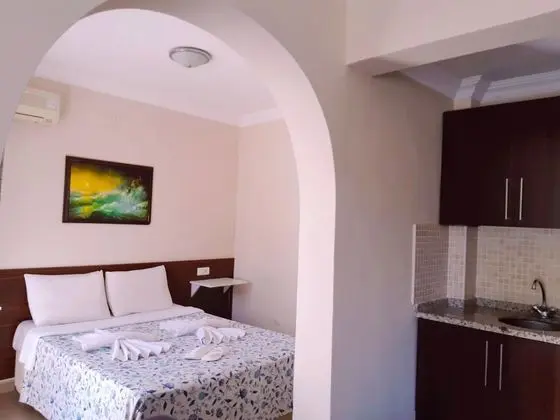 Üç Kişilik Oda, Bahçe Manzaralı, Balkonlu