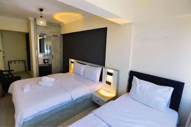Ekonomik Üç Kişilik Oda,Şehir Manzaralı,Balkonsuz