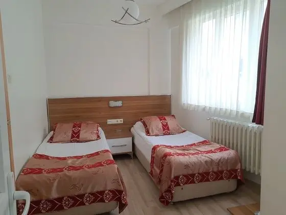 Üç Kişilik Oda
