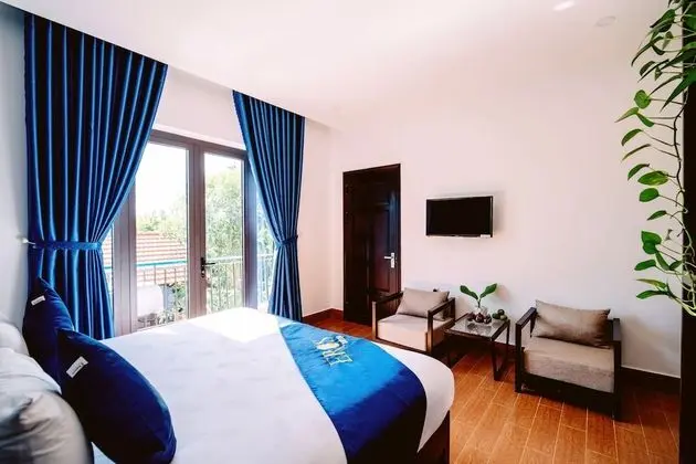 Deluxe Tek Büyük veya İki Ayrı Yataklı Oda, Balkon