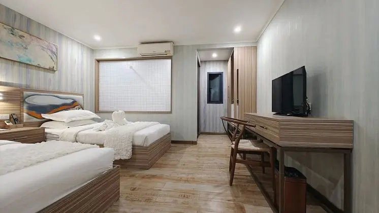 Deluxe Tek Büyük veya İki Ayrı Yataklı Oda
