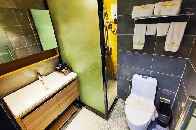 Deluxe Tek Büyük veya İki Ayrı Yataklı Oda