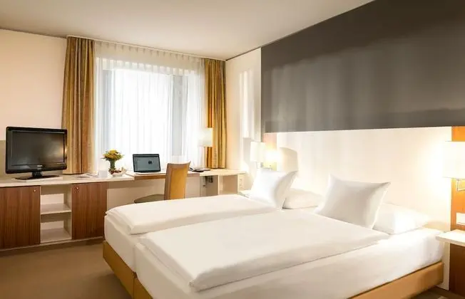 Tek Büyük veya İki Ayrı Yataklı Oda (Essential Double or Twin)