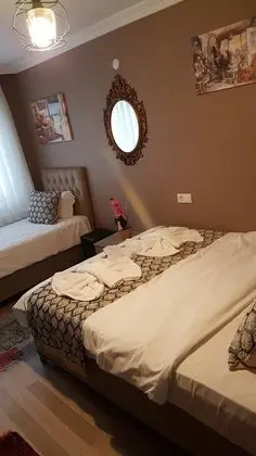 Üç Kişilik Oda
