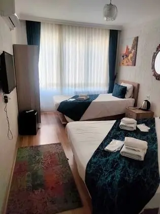 Üç Kişilik Oda