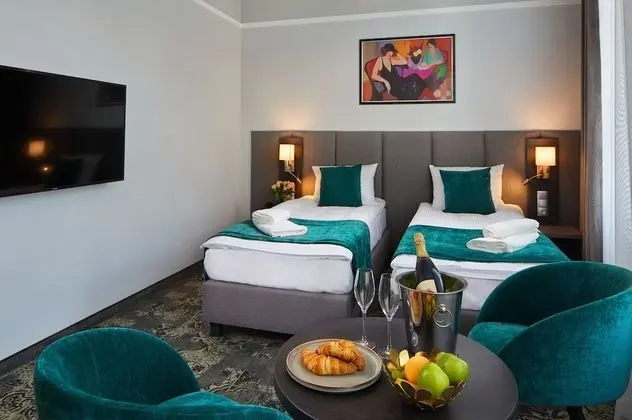 Classic Tek Büyük veya İki Ayrı Yataklı Oda