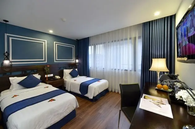 Deluxe Tek Büyük veya İki Ayrı Yataklı Oda