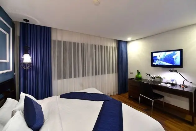 Deluxe Tek Büyük veya İki Ayrı Yataklı Oda