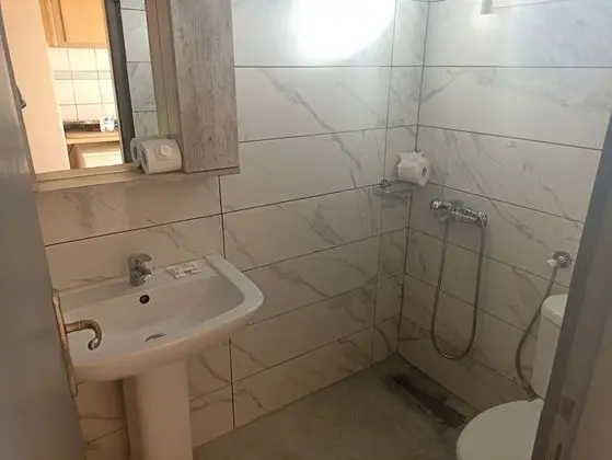 Standard Üç Kişilik Oda, Havuz Manzaralı