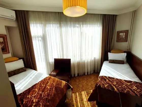 City Üç Kişilik Oda