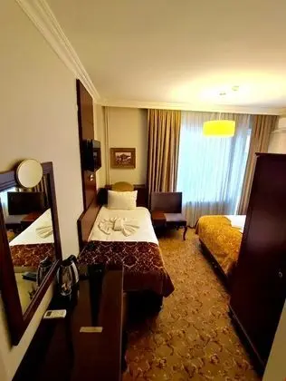 Üç Kişilik Aile Odası - Balkonlu Deniz Manzaralı