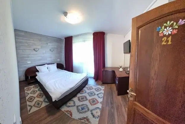 Comfort Tek Büyük veya İki Ayrı Yataklı Oda